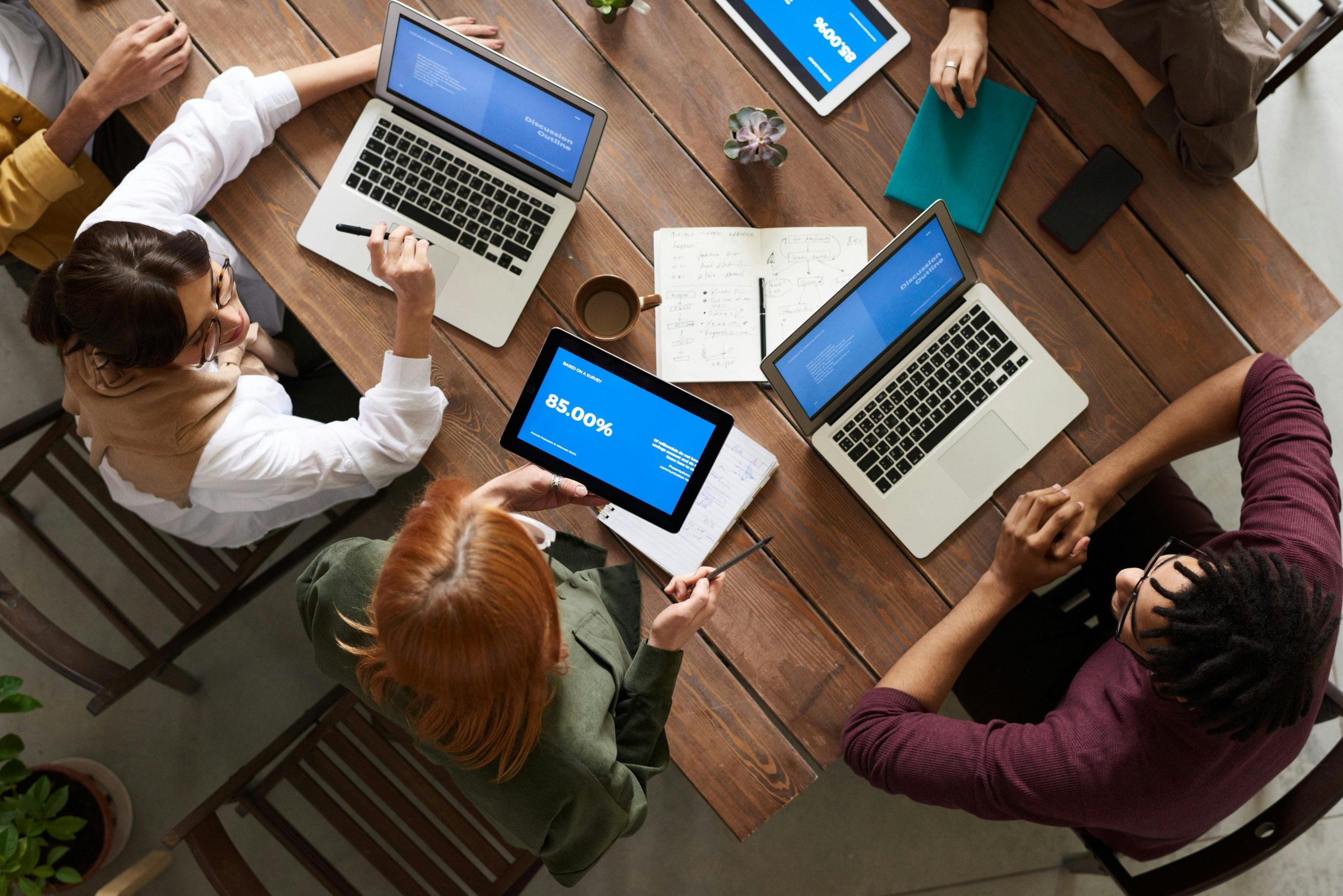 Many peoples are sitting with laptop and working